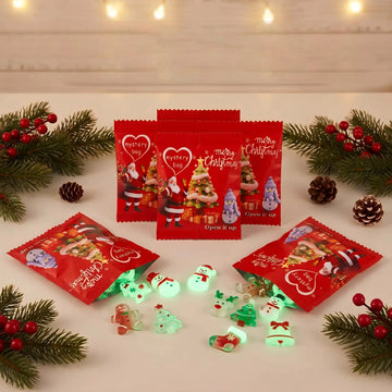 Red Christmas mystery bags with glowing resin holiday figurines