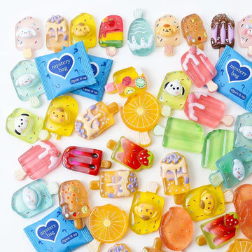 Colorful miniature resin ice cream and popsicle charms from Tiny Relics mystery blind bags