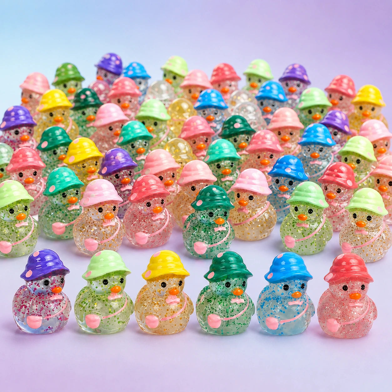 Bulk assortment of colorful glow-in-the-dark glitter duck mini figurines
