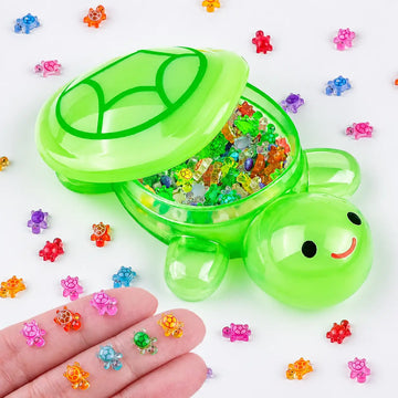 Large green turtle with colorful mini resin turtles